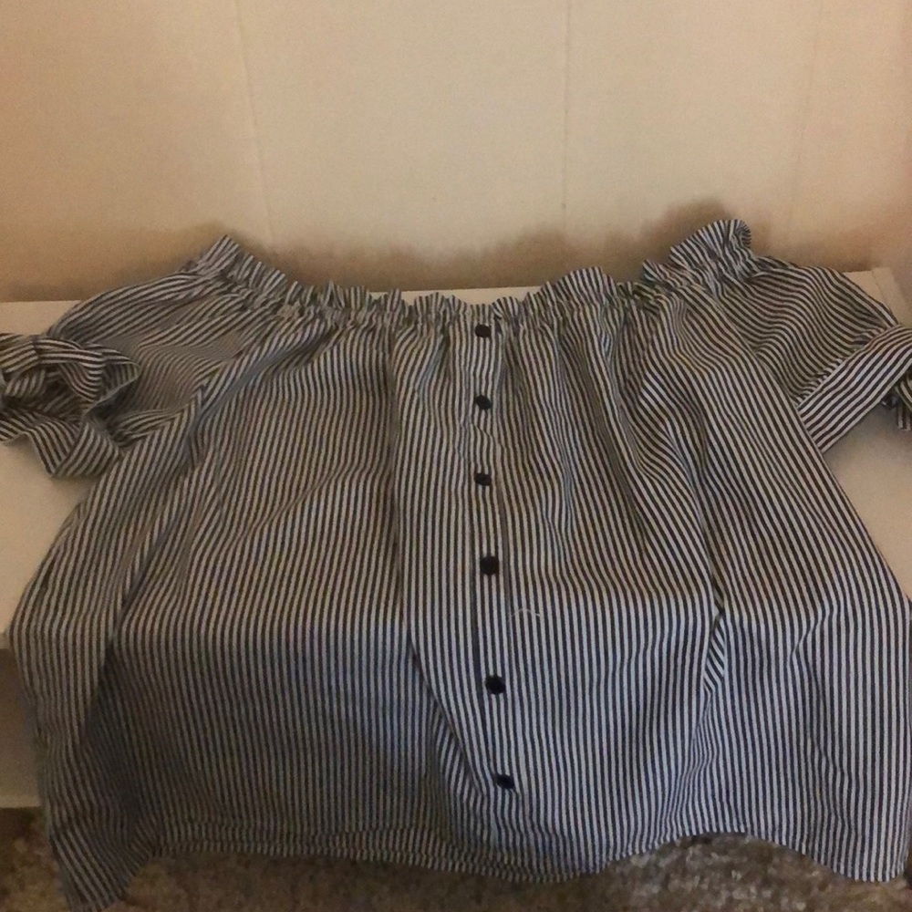 Off the shoulder shirt.